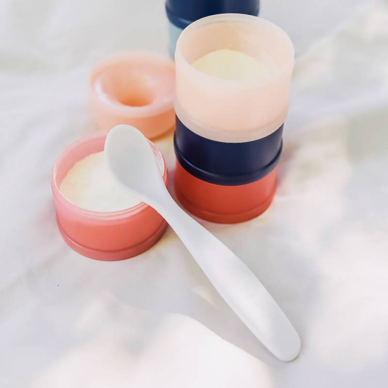 SUAVINEX DOSEUR DE LAIT MULTICOLORE